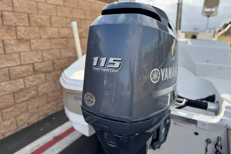 Slide: The Image of Yamaha 115 fuel injection outboard motor on 2013 NauticStar 203 SC boat. - 7