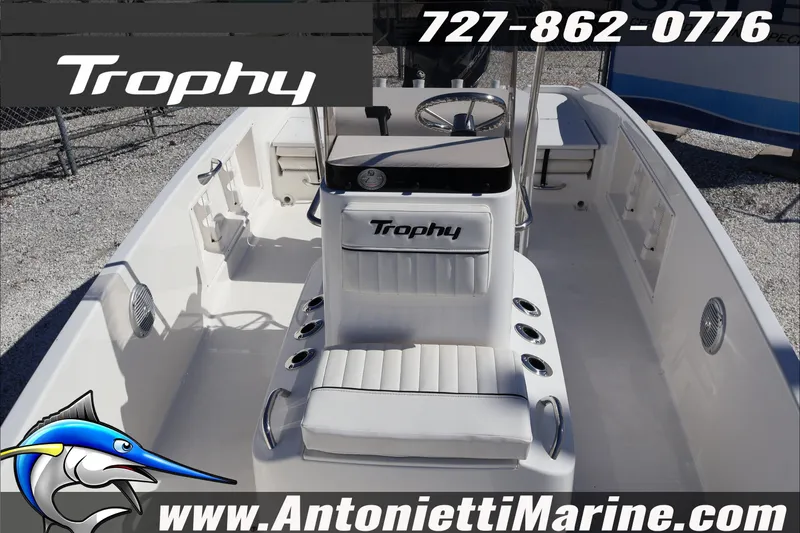 Slide: The Image of 2026 Trophy T18 Bay boat interior with seating and steering wheel, displayed by Antonietti Marine. - 21