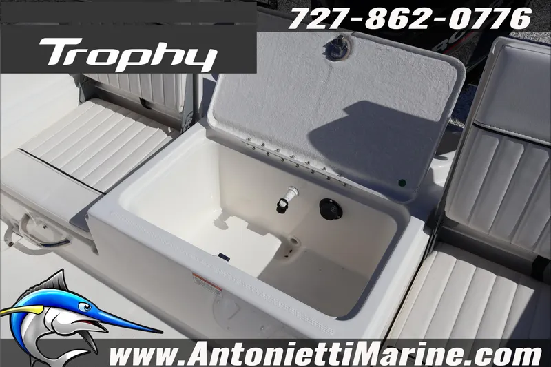 Slide: The Image of 2026 Trophy T18 Bay boat interior with seating and storage compartment. - 28