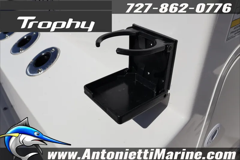 Slide: The Image of 2026 Trophy T18 Bay boat with cup holder and fishing rod holders. - 29