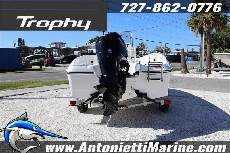 Slide: The Image of 2026 Trophy T18 Bay boat on trailer at Antonietti Marine dealership. - 3