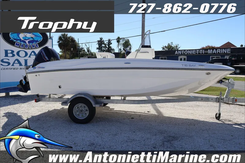 Slide: The Image of 2026 Trophy T18 Bay boat on trailer at Antonietti Marine dealership. - 5
