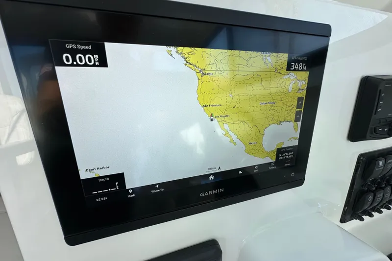 Slide: The Image of Garmin GPS display on Parker 227 Explorer boat, showing map and speed. - 17