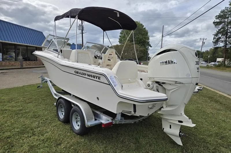 Slide: The Image of 2026 Grady-White Freedom 215 boat with Yamaha engine on trailer. - 9