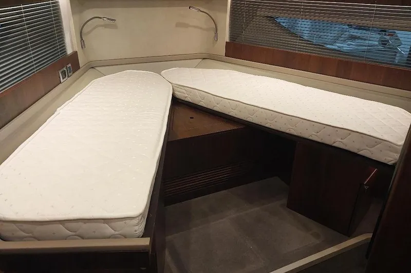 Slide: The Image of Interior cabin of 2022 Fairline Targa 45 GT with twin beds and modern design. - 20