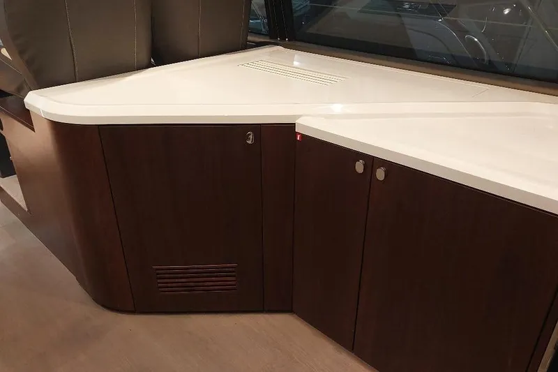 Slide: The Image of Interior cabinetry of 2022 Fairline Targa 45 GT yacht, featuring sleek wood finish and modern design. - 5