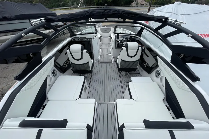 Slide: The Image of 2026 Yamaha Boats 222S interior, featuring sleek seating and modern design elements. - 10