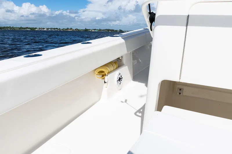 Slide: The Image of 2023 SeaVee 340Z boat interior with ocean view, featuring clean white design. - 42