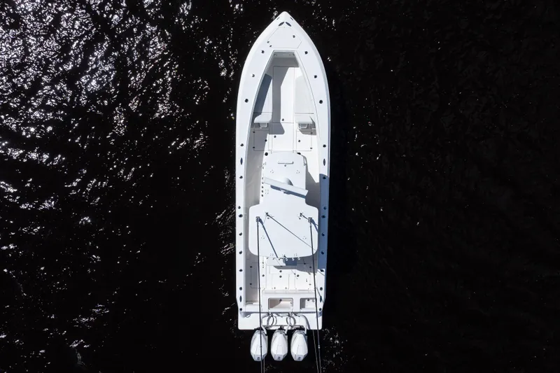 Slide: The Image of Aerial view of 2023 SeaVee 340Z boat on dark water. - 50