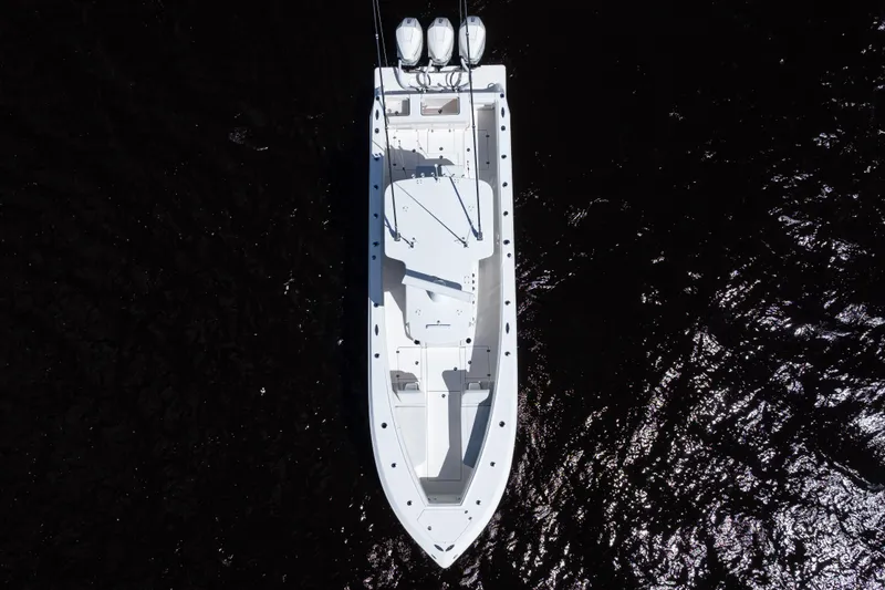 Slide: The Image of Aerial view of 2023 SeaVee 340Z boat on dark water. - 51