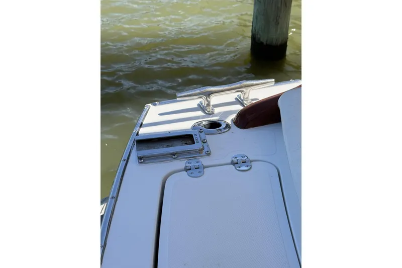 Slide: The Image of 2003 Hinckley Talaria 40 boat deck with cleat and water view. - 23