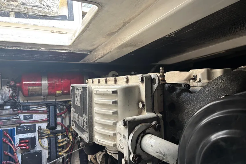 Slide: The Image of Engine room of a 2006 Rampage 38 Express boat, featuring mechanical components. - 29