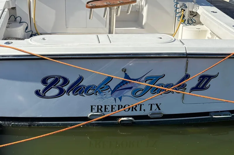 Slide: The Image of 2006 Rampage 38 Express boat named "Black Jack II" docked in Freeport, TX. - 9