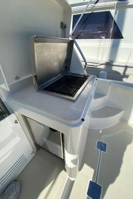 Slide: The Image of Outdoor grill on 2015 Sabre 42 Salon Express yacht. - 12