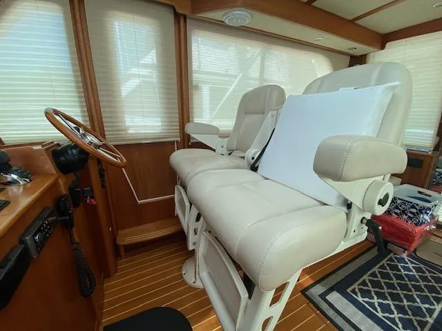 Slide: The Image of Interior helm of 2015 Sabre 42 Salon Express with leather captain chairs. - 14