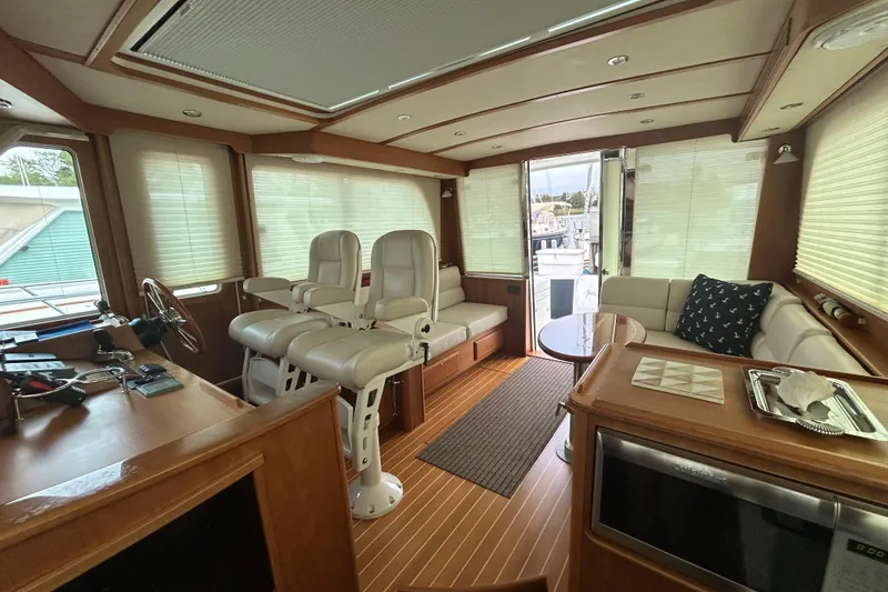 Slide: The Image of Interior of 2015 Sabre 42 Salon Express yacht with luxurious seating and modern amenities. - 18
