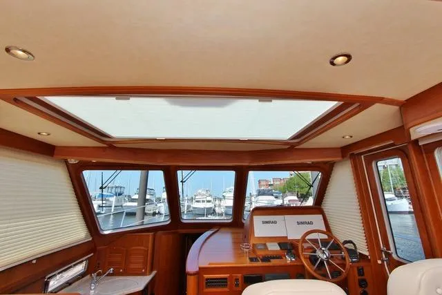 Slide: The Image of Interior helm of 2015 Sabre 42 Salon Express yacht with panoramic windows. - 20