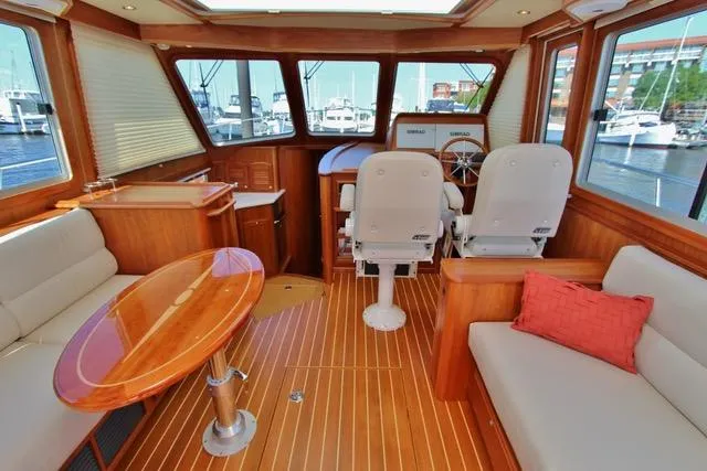 Slide: The Image of Interior of 2015 Sabre 42 Salon Express yacht with wooden flooring and seating. - 22