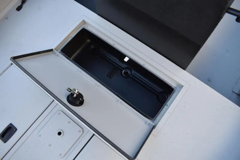 Slide: The Image of 2026 Lowe Roughneck RX1760 Pathfinder boat seat with sturdy metal frame. - 19