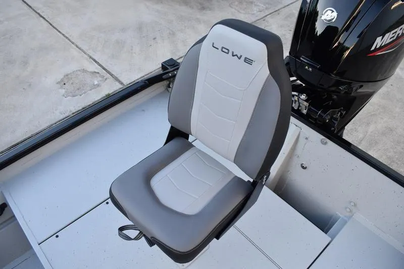 Slide: The Image of 2026 Lowe Roughneck RX1760 Pathfinder boat, close-up of sleek black exterior with logo. - 4