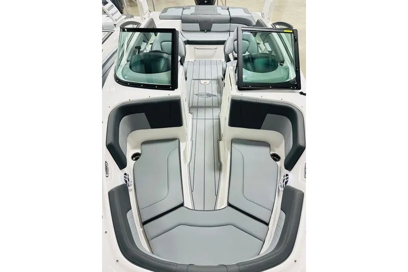 Slide: The Image of 2025 Chaparral 23 SSi OB boat interior with sleek seating and modern design. - 10