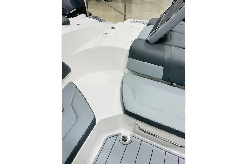 Slide: The Image of 2025 Chaparral 23 SSi OB boat interior with sleek seating and modern design. - 4