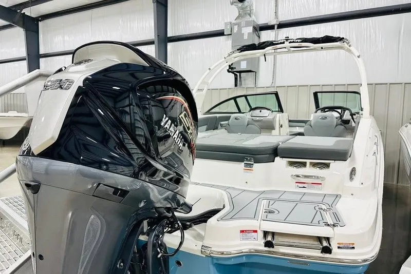Slide: The Image of 2025 Chaparral 23 SSi OB boat with Yamaha outboard motor in showroom. - 9