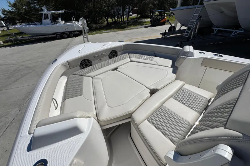 Slide: The Image of 2025 Solace 28 HCS boat interior with luxurious seating and modern design. - 18