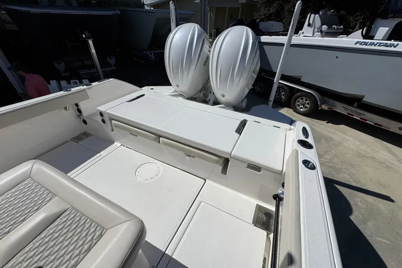 Slide: The Image of 2025 Solace 28 HCS boat with dual engines and spacious seating area. - 36