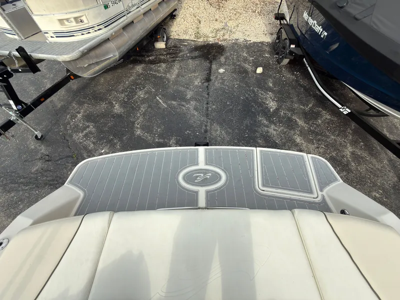 Slide: The Image of Rear view of a 2008 Sea Ray 230 Select boat on a trailer. - 6
