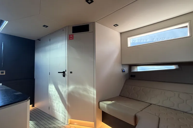 Slide: The Image of Modern interior of 2022 Vanquish VQ45 yacht with sleek design and comfortable seating. - 23
