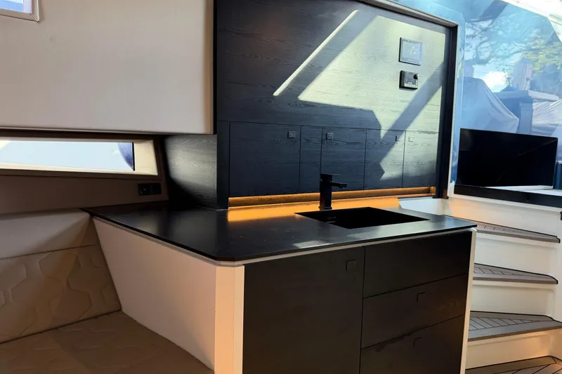 Slide: The Image of Modern interior of 2022 Vanquish VQ45 yacht with sleek kitchen design. - 24