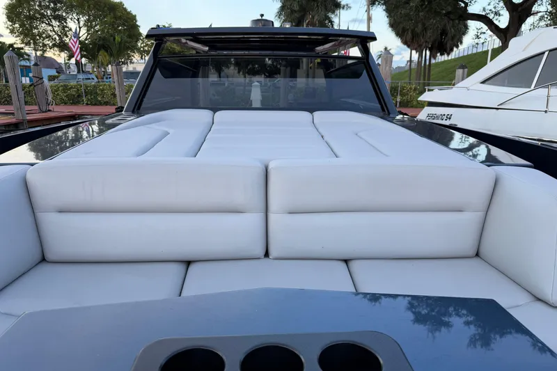 Slide: The Image of Luxurious 2022 Vanquish VQ45 yacht with spacious white seating and sleek design. - 33