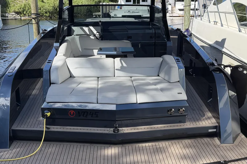 Slide: The Image of 2022 Vanquish VQ45 luxury yacht with sleek design and spacious seating. - 4