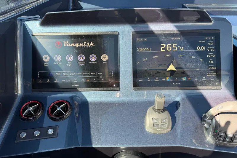 Slide: The Image of Dashboard of 2022 Vanquish VQ45 yacht with Garmin navigation displays. - 7