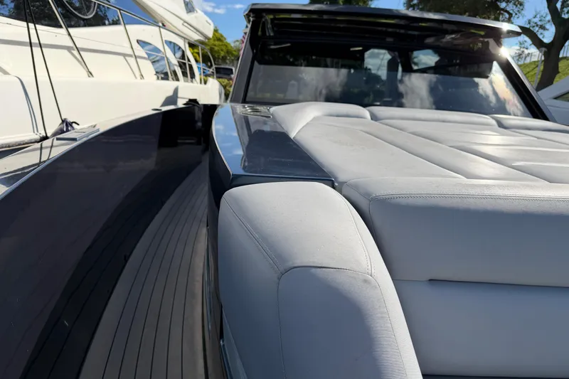 Slide: The Image of 2022 Vanquish VQ45 luxury yacht with sleek design and comfortable seating. - 16