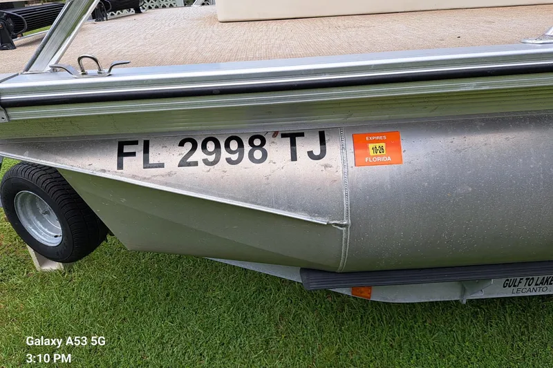 Slide: The Image of 2021 Avalon GS CC Fish boat with Florida registration FL 2998 TJ on trailer. - 5