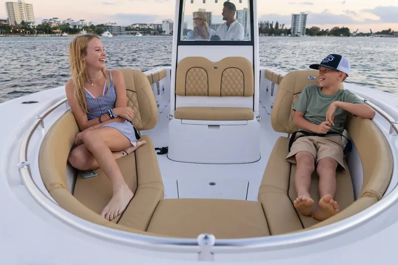 Slide: The Image of Manufacturer Provided Image: 2025 Sportsman Open 262 Center Console with passengers enjoying a boat ride. - 3