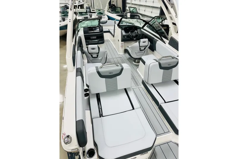 Slide: The Image of 2026 Chaparral 250 OSX boat interior with luxurious seating and modern design. - 15
