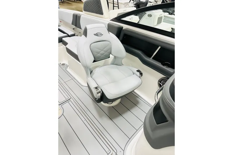 Slide: The Image of 2026 Chaparral 250 OSX boat interior with luxurious seating and modern design. - 5