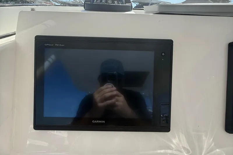 Slide: The Image of Garmin GPSMAP 7612xsv on 2016 Edgewater 280CC boat dashboard. - 23