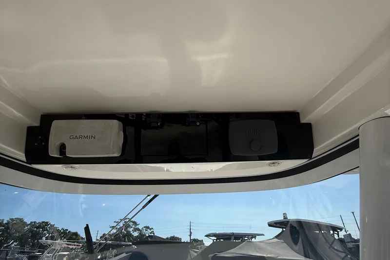 Slide: The Image of 2016 Edgewater 280CC boat dashboard with Garmin navigation system. - 26