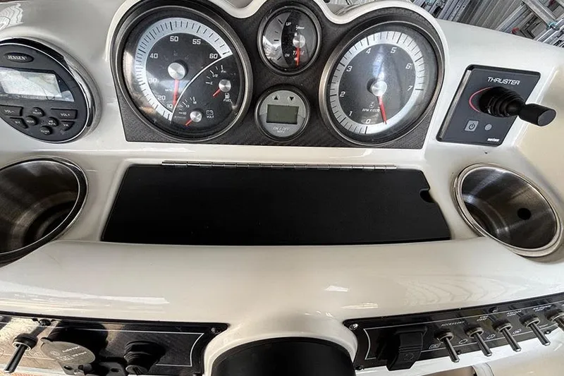 Slide: The Image of Dashboard of a 2017 Bayliner Element XR7 boat with gauges and controls. - 7