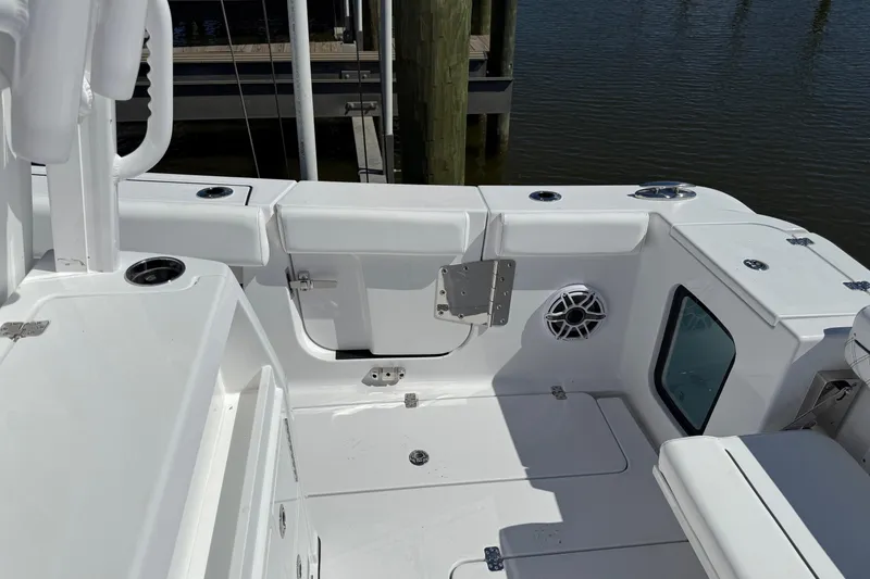 Slide: The Image of 2026 Sportsman Open 302 Center Console boat interior, featuring sleek white design and modern fixtures. - 5