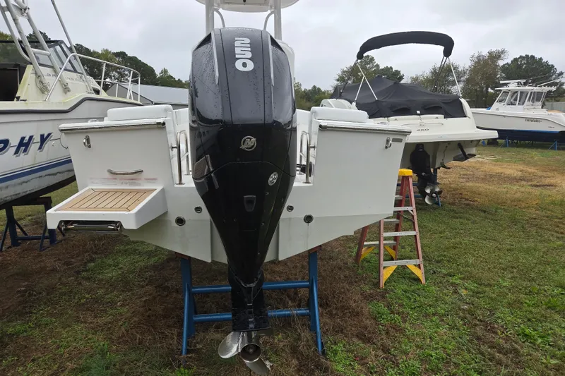 Slide: The Image of 2022 Limestone L200CC boat with powerful outboard motor on display outdoors. - 3