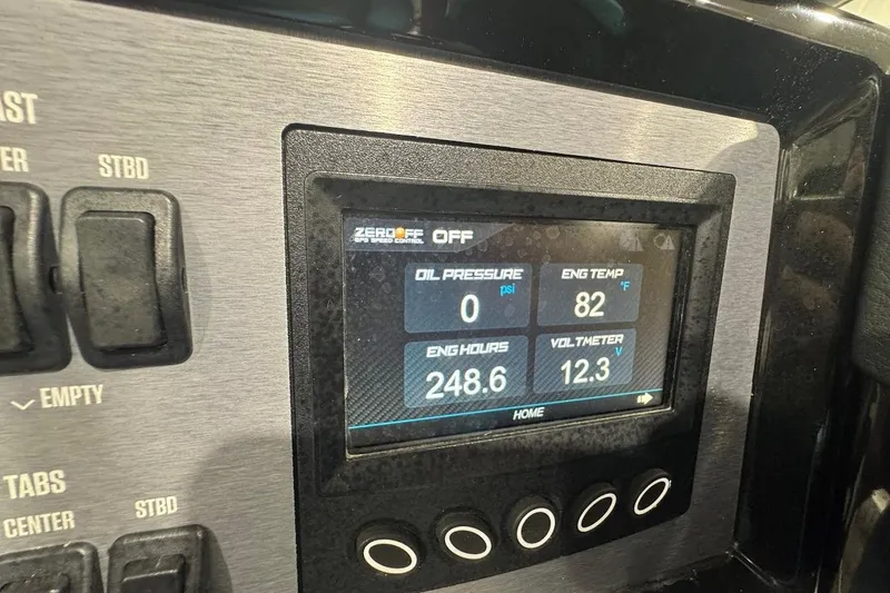 Slide: The Image of Dashboard of a 2020 MasterCraft NXT22 boat showing engine metrics and controls. - 11