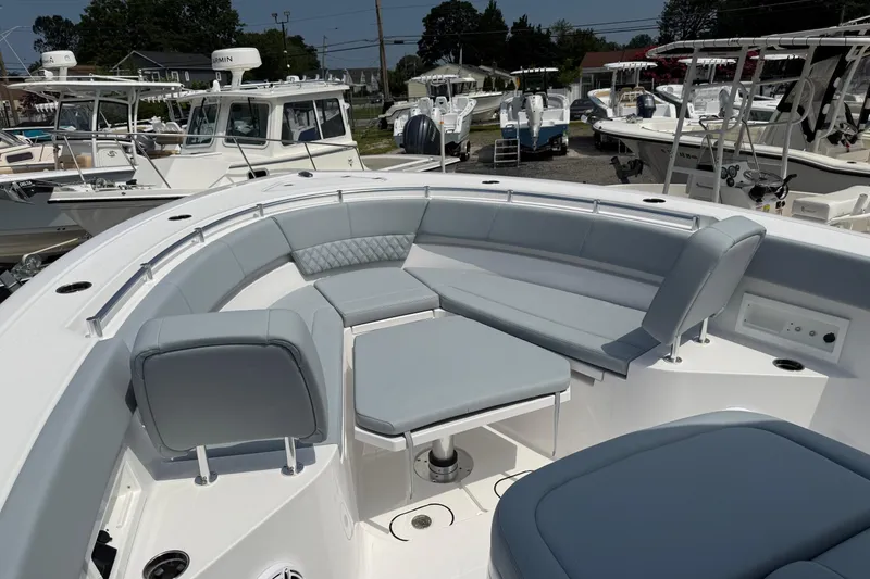 Slide: The Image of 2026 Sportsman Heritage 321 Center Console boat with spacious seating area. - 31