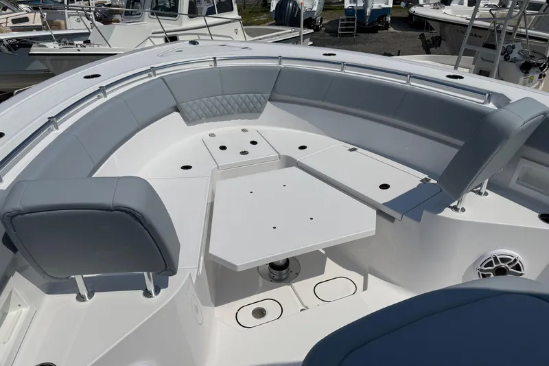 Slide: The Image of 2026 Sportsman Heritage 321 Center Console boat with spacious seating and modern design. - 33