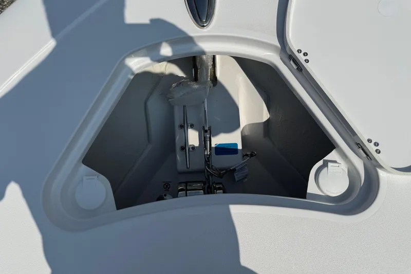 Slide: The Image of Open storage compartment on 2026 Sportsman Heritage 321 Center Console boat. - 35