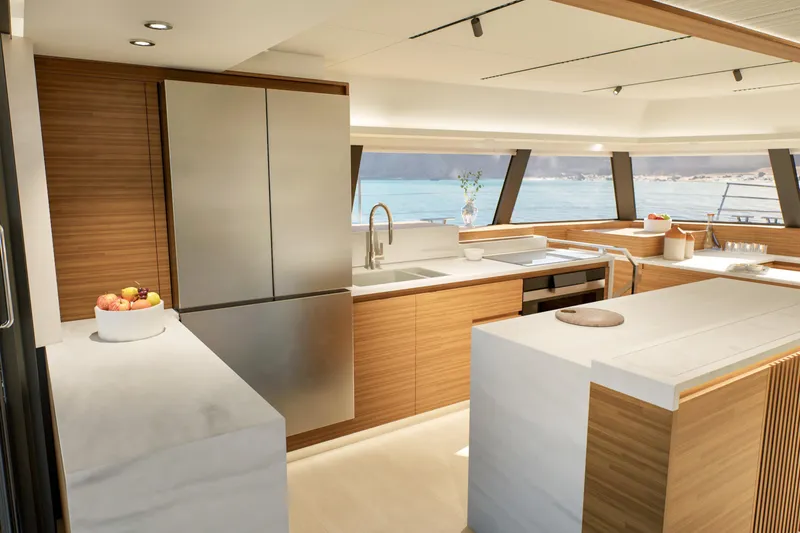 Slide: The Image of Luxurious kitchen interior of 2027 Fountaine Pajot 70 S yacht with modern design. - 31